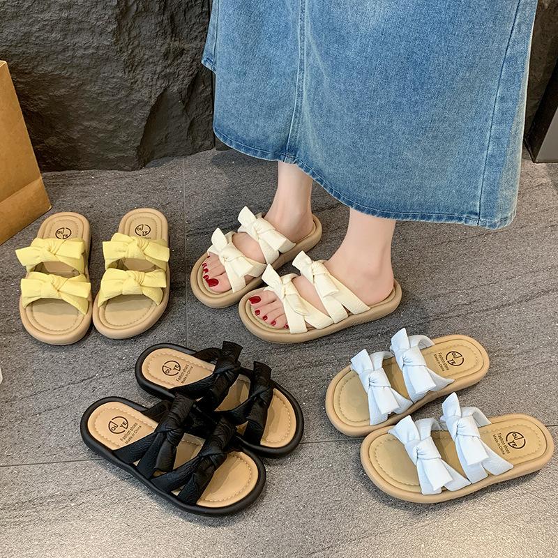 Sandals women's summer thick-bottomed versatile skirt 2025 wear new slippers one-word bow