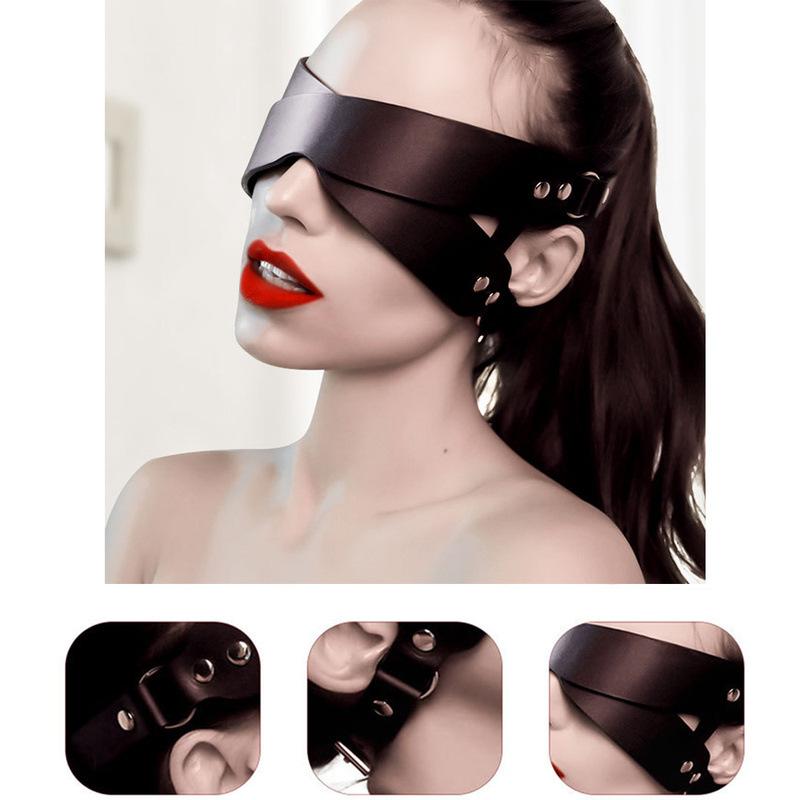 A unique and unconventional couple's accessory - a sexy and abstinent cross-piece black leather ear cover.