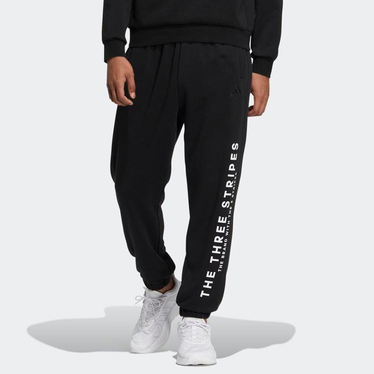 adidas Повседневные брюки унисекс черные с умеренной манжетой IA9433