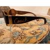 Б/у солнцезащитные очки COACH с металлическим футляром с логотипом, черная signature