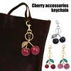 Keychain Bag Charm with Golden Shimmering Resin Cherries Hypoallergenic Steel Key Pendant Bag