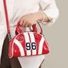 Red Hard and Three-dimensional Striped Tote Bag with a Sense of Luxury, Suitable for Crossbody or Hand-held Use.