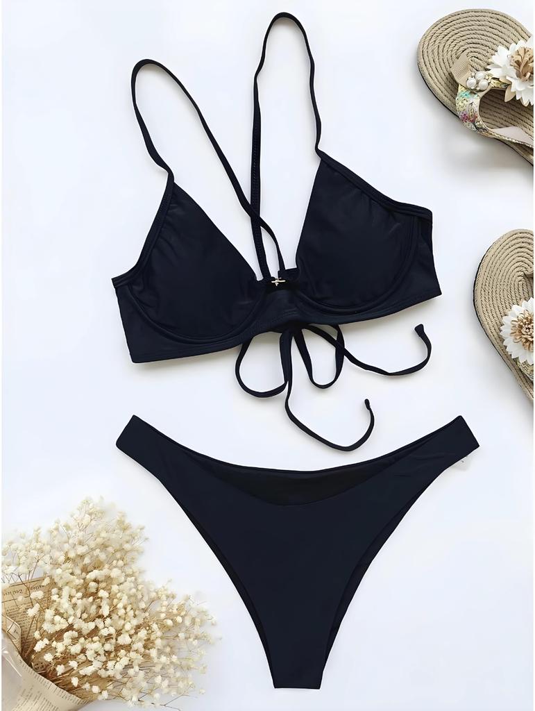 Push-up bikini swimsuit with lace up black high waist cutout. L push-up bikini swimsuit with lace up black high waist cutout.