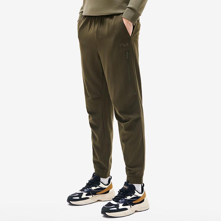 Fila Однотонные тканые зауженные спортивные брюки Мужские брюки Соломенно-зеленый F11M218801FKK
