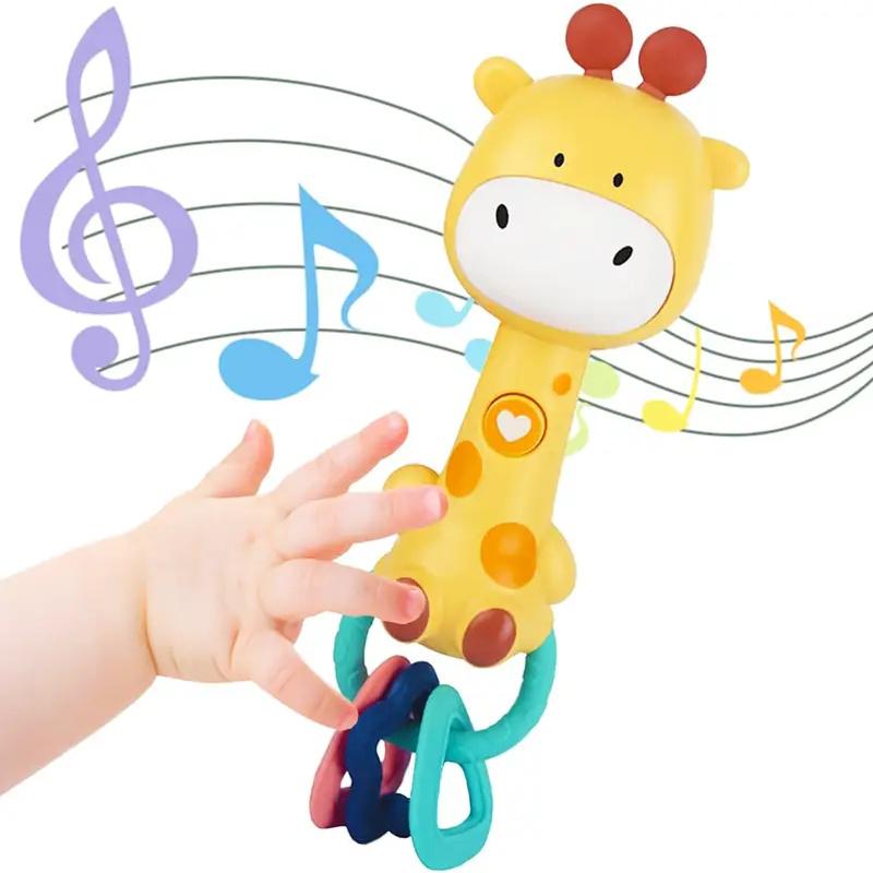 Baby Musical Rattle ToyLightUp Teether & Sensory Chew, BPAFree Soft Rubber, Baby Shower & 1st Birthday Gift for 618 Months