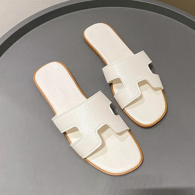 Женские тапочки, новые классические модные тапочки на плоской подошве, кожаные сандалии для отдыха на природе, женские дорожные пляжные шлепанцы, обувь для женщин