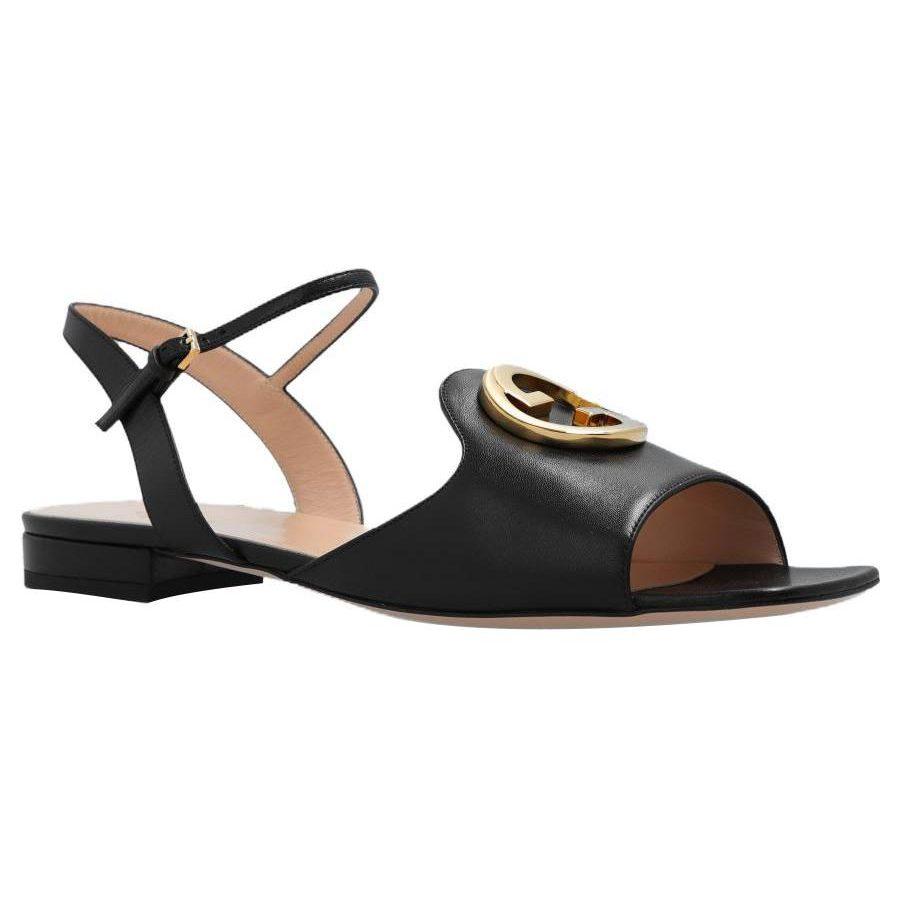 Gucci Кожаные сандалии с переплетающимся логотипом G 729957 C9D00 1000