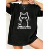 Black Oversized T-Shirt With Cat Graphic And Fluff Around And Find Out Text For Casual Wear