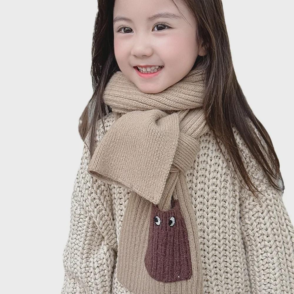 Children's Cartoon Knit Scarf: Autumn & Winter Warm Wool Scarf with Pocket & Embroidered Eyes for Boys & Girls.