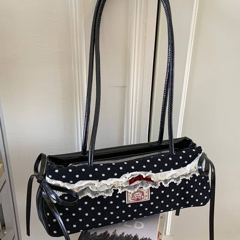 Летняя новая портативная наплечная сумка, высокая ценность, маленькая сумка в черно-белый горошек, модная сумка для通勤 для женщин