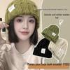 Women's Chunky Knit Green Beanie: Cozy Winter Hat with Letter Design, Cable Knit, Loose Fit for a Slimming Effect.