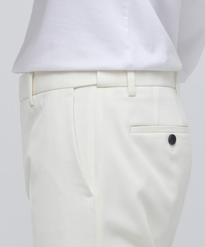MUSINSA STANDARD Skinny Hidden Elastic Waist Crop Slacks [Cream]