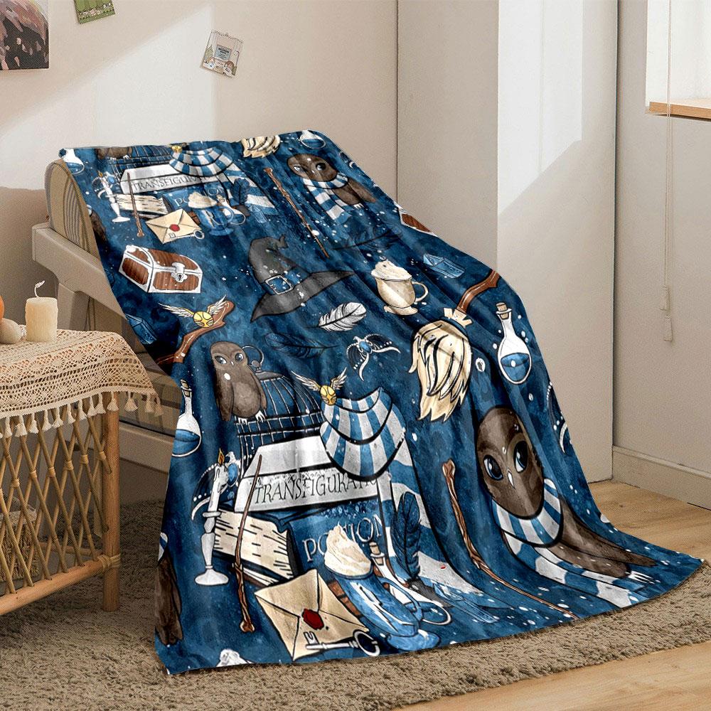 Magical objects, owls, scarves, and books on a blue whimsical pattern. for all seasons blanket lunch break throw gift