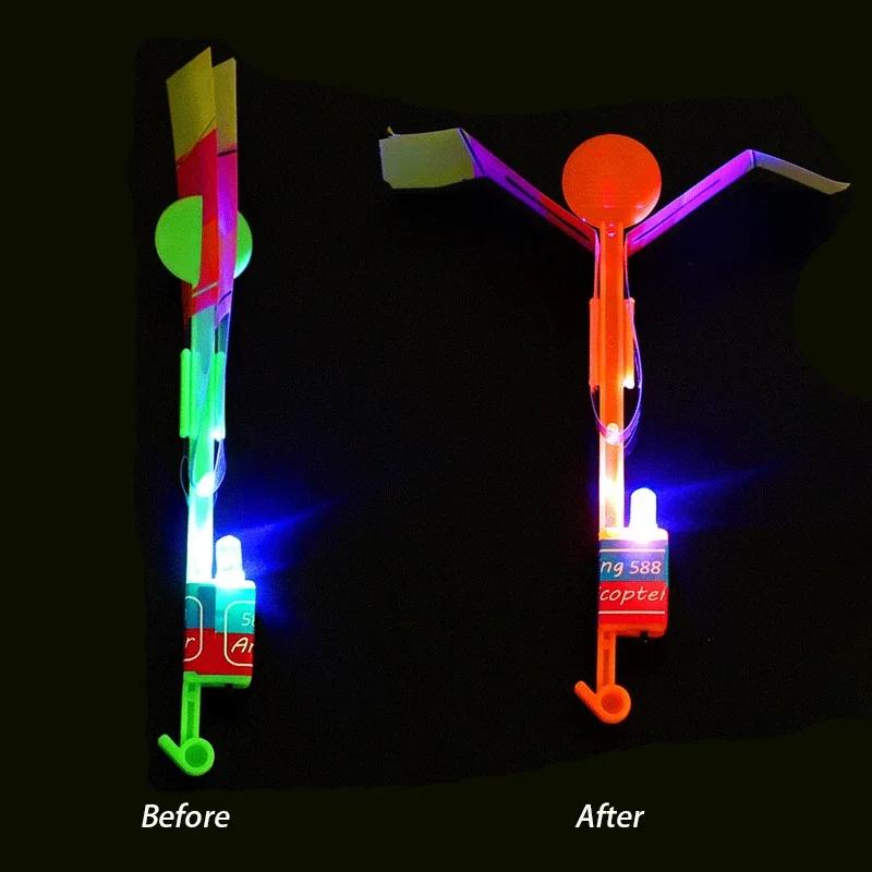 10pcs Amazing Light Toy Arrow Rocket Helicopter Flying Toy LED Light Toys Party Fun Gift Rubber Band Catapult
