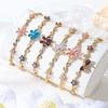 Fine Fashion Jewelry 18k Gold Plated Brass Bowknot Bracelet Exquisite Zircon Flower and Bow Charm Bracelet for Women