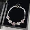 Браслет Versa Simulation Jewelry с микро-вставками зеленых бриллиантов, покрытие белым золотом, разноцветный, ручная работа, женский