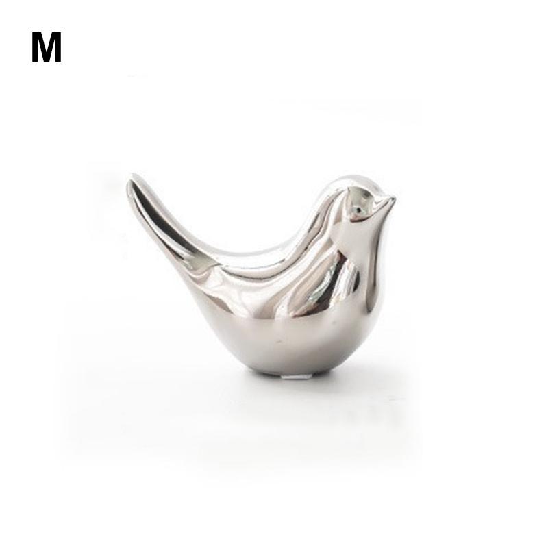 Серебряные керамические украшения в виде птиц. Роскошные простые керамические фигурки птиц. Золотые керамические фигурки птиц.