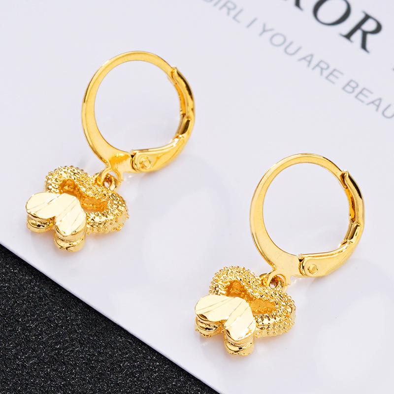 Высококачественные серьги с имитацией песочного золота: Долговечный дизайн кисточек для женщин, трансграничные медные аксессуары