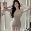 Spice girl sexy hooded V-neck dress women's autumn and winter new temperament advanced tight and thin inner hip skirt