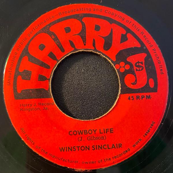 7-дюймовая пластинка WINSTON SINCLAIR THE JAY BOYS Cowboy Life Cowboy Life Instrume NONE Harry J Records Ямайка Регги Ска Дуб Б/у