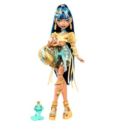 Включает куклу Monster High Клео де Нил, золотистую блузку и многослойную юбку, питомца кобру Хисет и аксессуары, такие как рюкзак, закуски, свиток и многое другое.