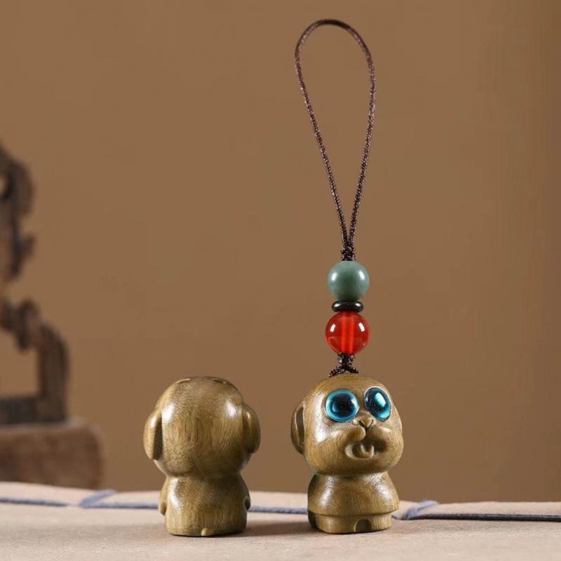 Twelve Zodiac Animal Charms Green Sandalwood Set: Rat, Ox, Tiger, Rabbit, Dragon, Snake, Horse, Sheep, Monkey, Rooster, Dog, Pig.