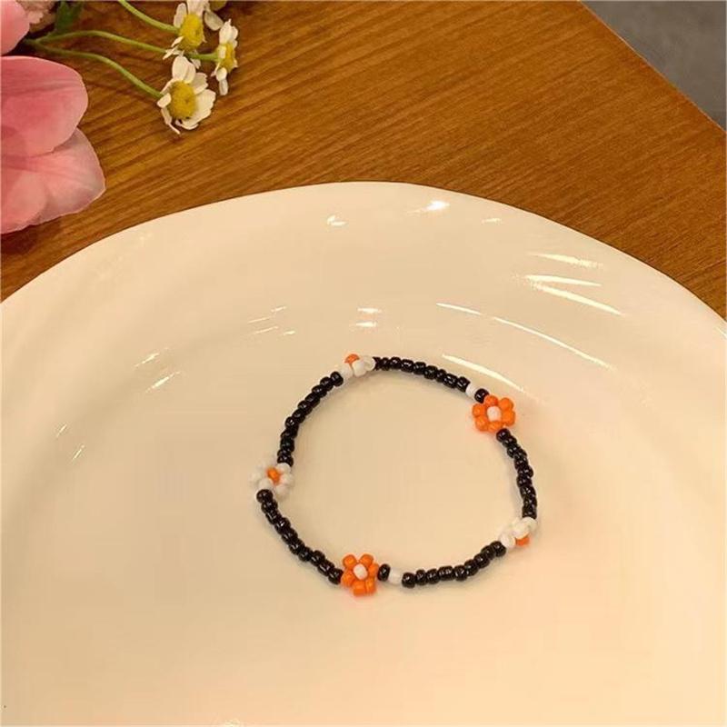 Браслет из бисера «Цветок-смайлик»