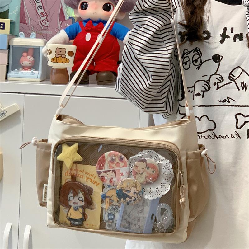 College Wind Baby Bag Pain Bag Versatile Simple Large Capacity Class Loading Book Mailman Bag Female Transparent Bar One Shoulder Crossbody