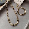 Элегантный комплект ожерелий с тигровым глазом и жемчугом для женщин