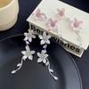 The new light luxury 3D floral fringe women's earrings feature irregular hanging earrings design and unique jewelry accessories