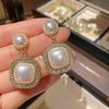 Silver needle light luxury Spice Girl pearl stud earrings temperament retro super flash earrings women's fashion high sense personalized earrings
