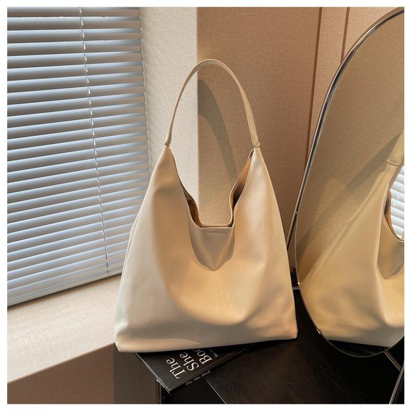 Вместительная сумка подмышку женская новая модная трендовая сумка на плечо для通勤, универсальная повседневная сумка-тоут