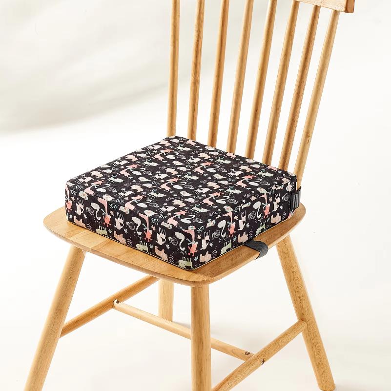 Portable waterproof booster seat cushion for babies, perfect for outdoor use.