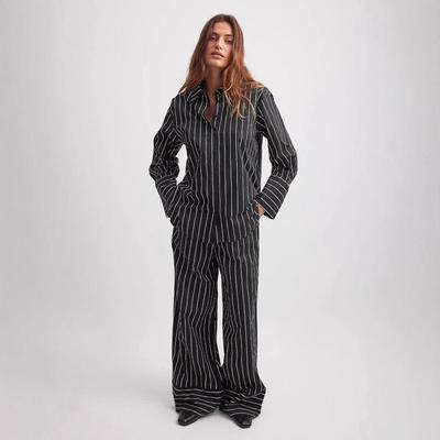 Комплект женских брюк в полоску с широкими штанинами в европейском и ближневосточном стиле - Элегантный OL-стиль для 2024 года.