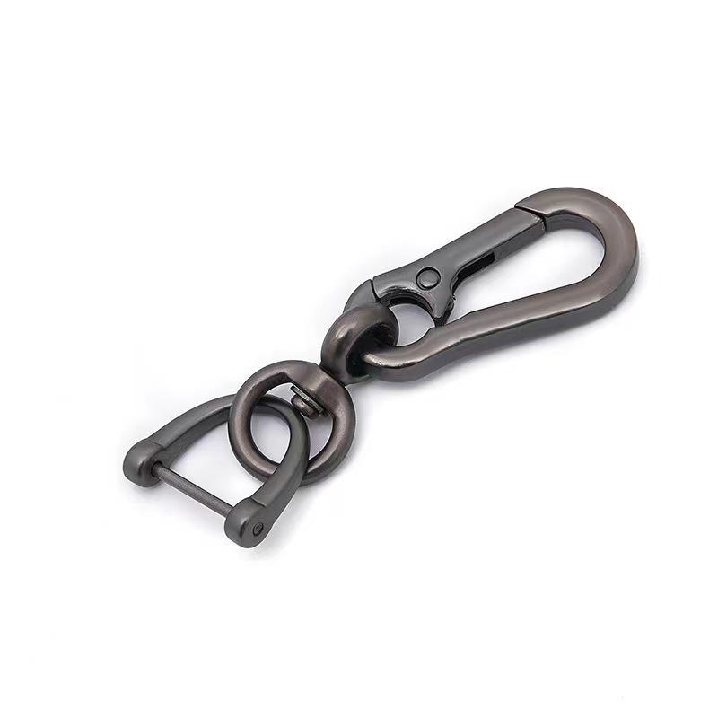 Брелок для ключей автомобиля в виде восьмерки с подковообразной пряжкой, табличка с номером против потери, плетеная веревка и круглый кулон