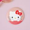 Круглое ручное зеркало Hello Kitty розового цвета