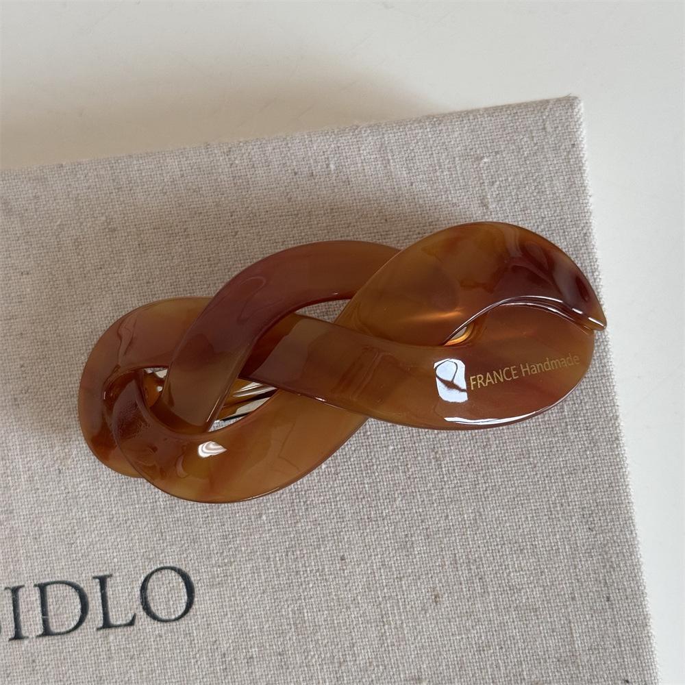 Korean version fashion French retro twist woven shape large ponytail spring clip disc hair top clip hair accessories new