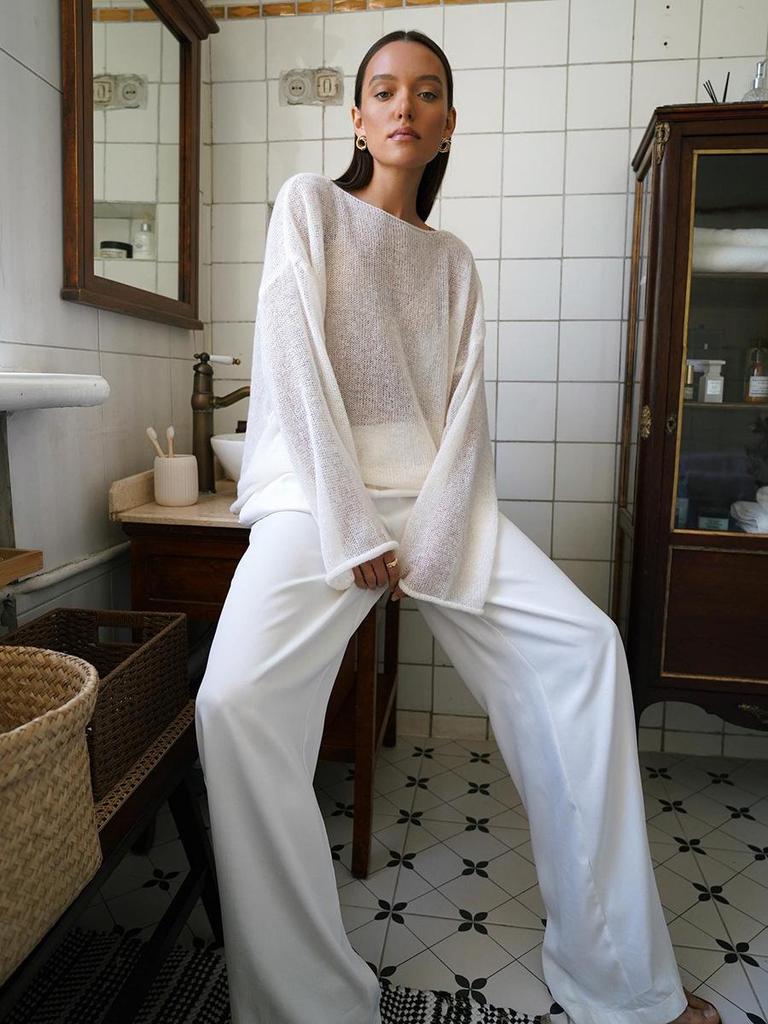 2025 Spring/Summer European-American Hollow Knit Sweater: Women's Thin, Large Round Neck, Trumpet Sleeve T-Shirt