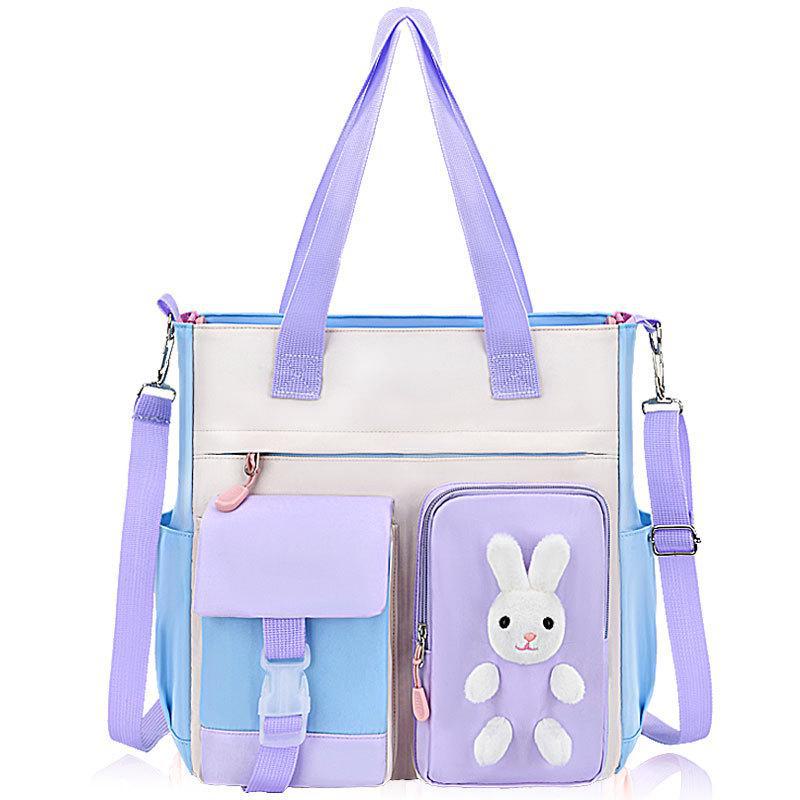 Универсальная школьная сумка для учеников начальной школы — карманная, через плечо или через почтальонку