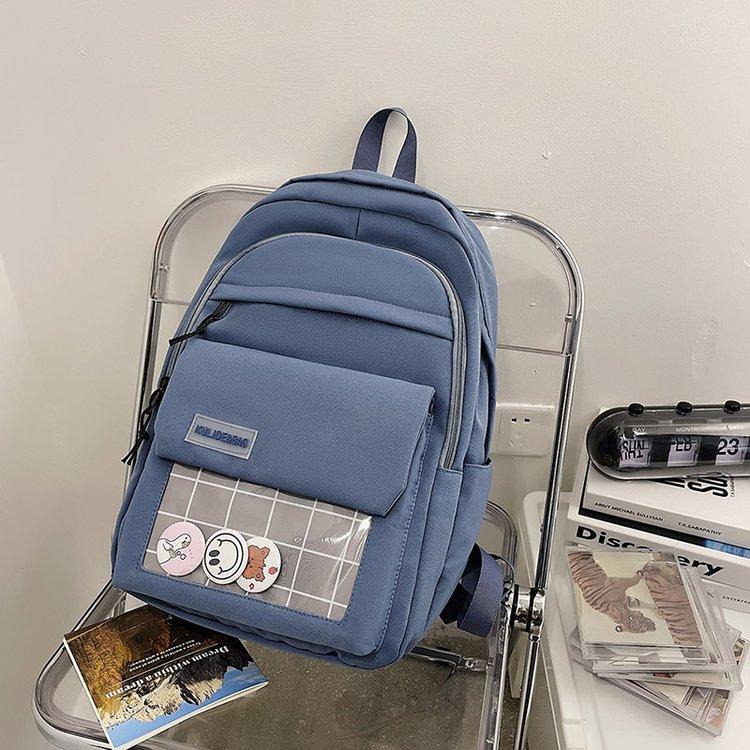 Schoolbag female Korean version four-piece ins Mori versatile campus cool elementary school junior high school high school large capacity backpack