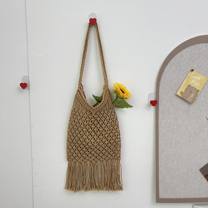 Сумка из полой хлопковой нити, плетеная, 2025 новая, на одно плечо, с кисточкой, соломенная сумка, пляжная сумка для отпуска, универсальная женская сумка под мышкой