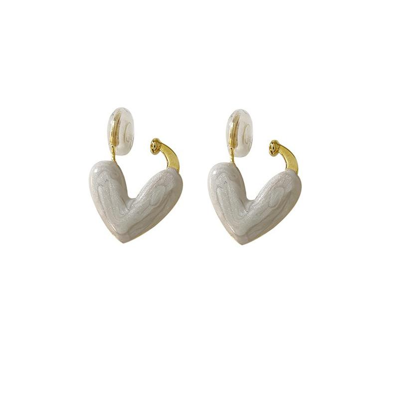 Love drop glaze ear clips without ear holes, high-end niche design, light luxury mosquito coil disc earrings, spring and summer popular ear buckles