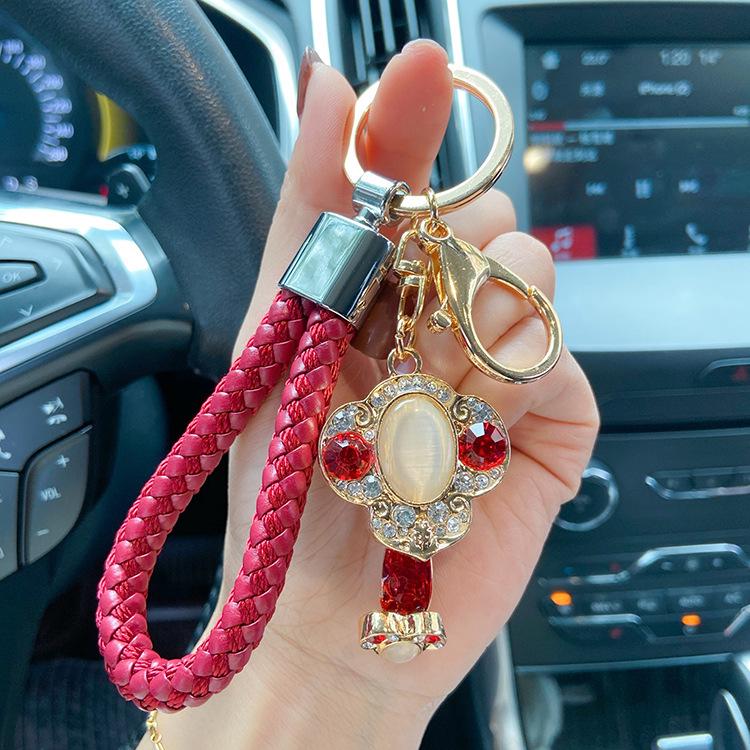 "2023 Red Series God of Wealth Keychain: Creative Money Bag for Car Keys, Annual Meeting Gift with Custom Logo Engraving"