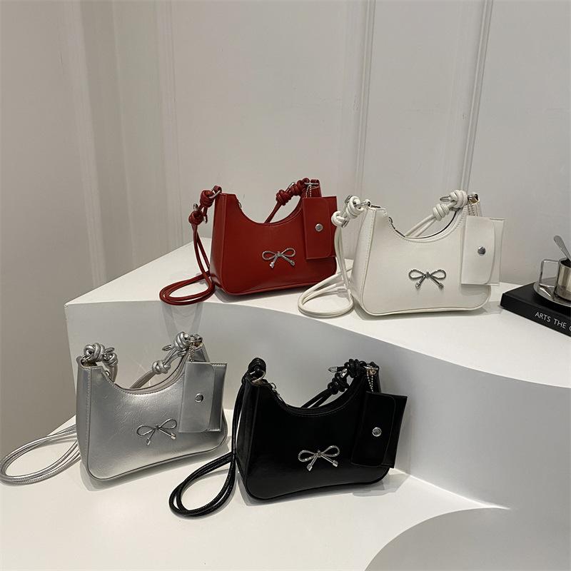 Сумка-мешок с бантом подмышкой женская 2024 новая простая сумка-ведро для поездок на работу высококачественная фактурная сумка-мессенджер через плечо tide