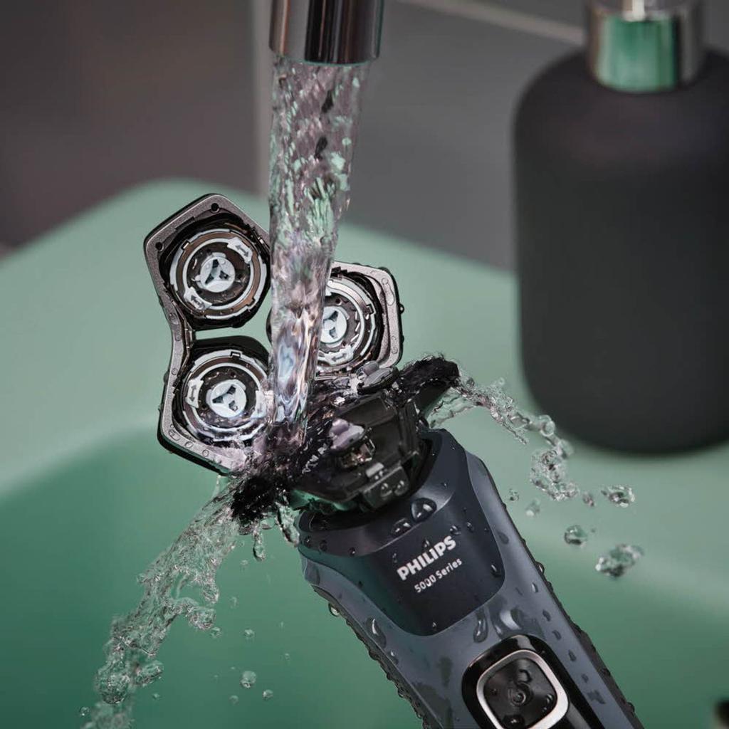 Электробритва SkinIQ серии 5000 S5880/33 Цвет: Океанский синий