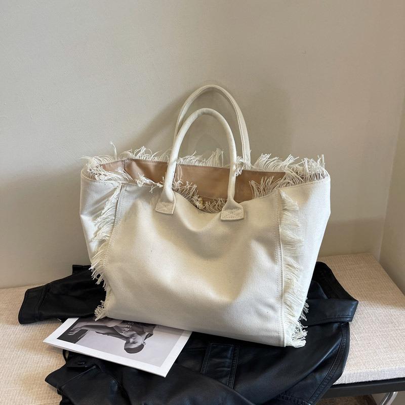 Нишевый дизайн большая вместимость тоут бахрома сумка премиальная текстура холст сумка через плечо