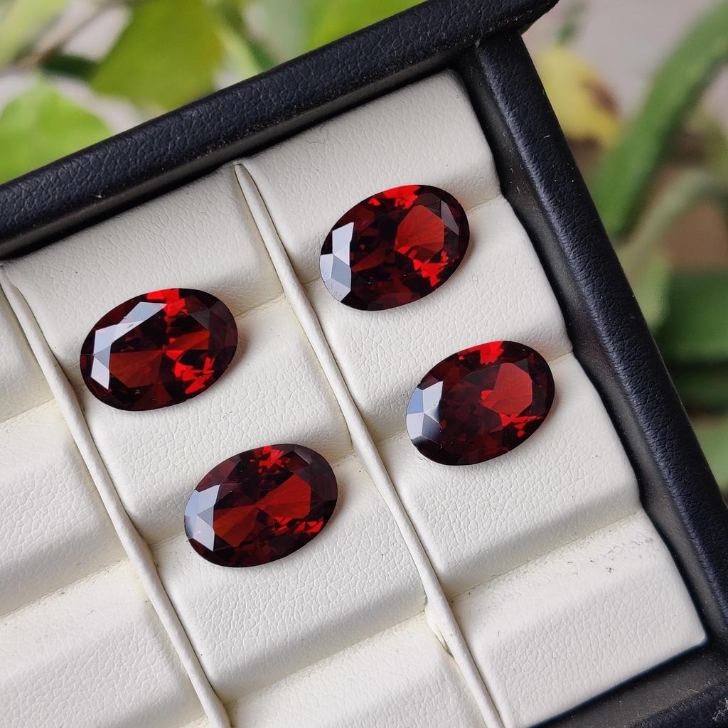 Партия россыпью цирконов, Натуральный циркон овальной огранки размером 14x10 мм, Целебная партия цирконов красного цвета.