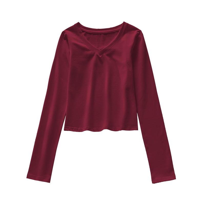 Новая футболка с V-образным вырезом и длинными рукавами для женщин на осень и зиму разработана как базовый слой с облегающим силуэтом, подчеркивающим фигуру.