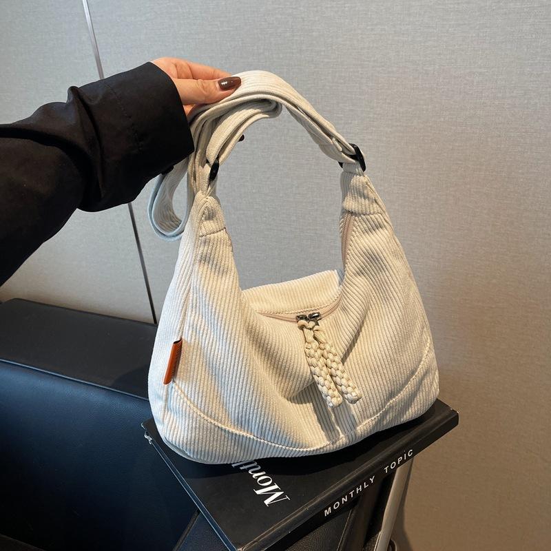 Retro student class versatility new dumpling bag women's solid color light casual commuting personality pleated crossbody bag