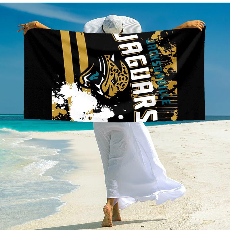 proof beach towel with Jacksonville Jaguars logo pattern - soft,absorbent,quick-drying,machine washable - perfect for swimming,camping,bathing